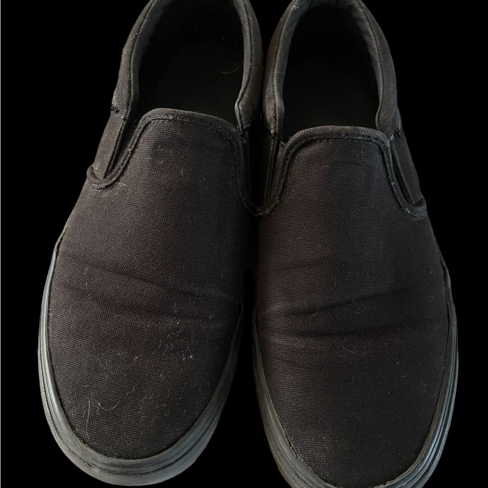 Vans, mens size 9, black slip on.